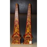 A pair of red 19th Century style Toleware obelisks, painted with Chinese figures and landscapes,