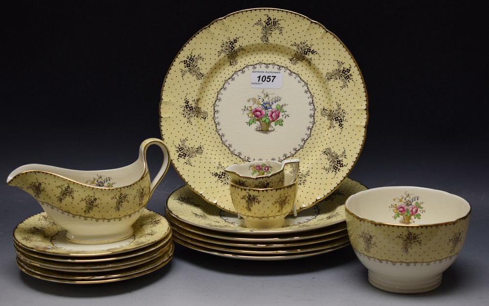 A Mintons part dinner service, pale lemon border on cream ground, brown sprigs,