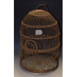 A wire domed travelling bird cage