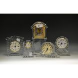 A crystal glass mantel timepiece;