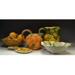 An Italian pottery Pumpkin pattern jug; a Portugese pottery bowl;