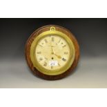 A 20th century brass wall clock, Dent, London, subsidiary seconds dial,