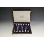 A cased set of twelve silver coffee bean spoons,