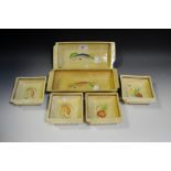 A set of six Susie Cooper, Crown Works hors d'oeurve dishes, each with stylised fish,