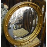 A convex gilt framed applied with spheres mirror;