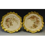 A pair of Royal Worcester shaped circular plates,