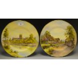 A Royal Worcester circular plate, painted by A W Willett, signed with Worcester Cathedral,