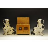 A pair of Staffordshire mantel dogs,