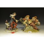 A Capodimonte figure of a Tramp feeding a Squirrel;