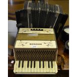 A Hohner Student steel reed piano accordion;