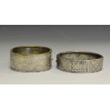 An Aesthetic Movement silver hinged bangle;