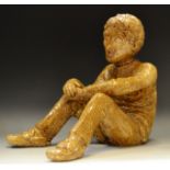 An Art Pottery stoneware figure of a seated Man in quiet contemplation