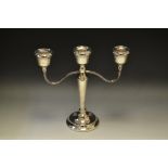 A contemporary silver three light two branch candelabrum, 23cm high,