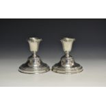 A pair of Elizabeth II silver candlesticks, Adie Brothers Ltd,