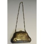 A George V silver bag shaped purse,