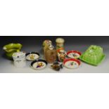 Ceramics- a Derby miniature twin handled vase; a set of four Wade pin dishes; a Wade Fish;