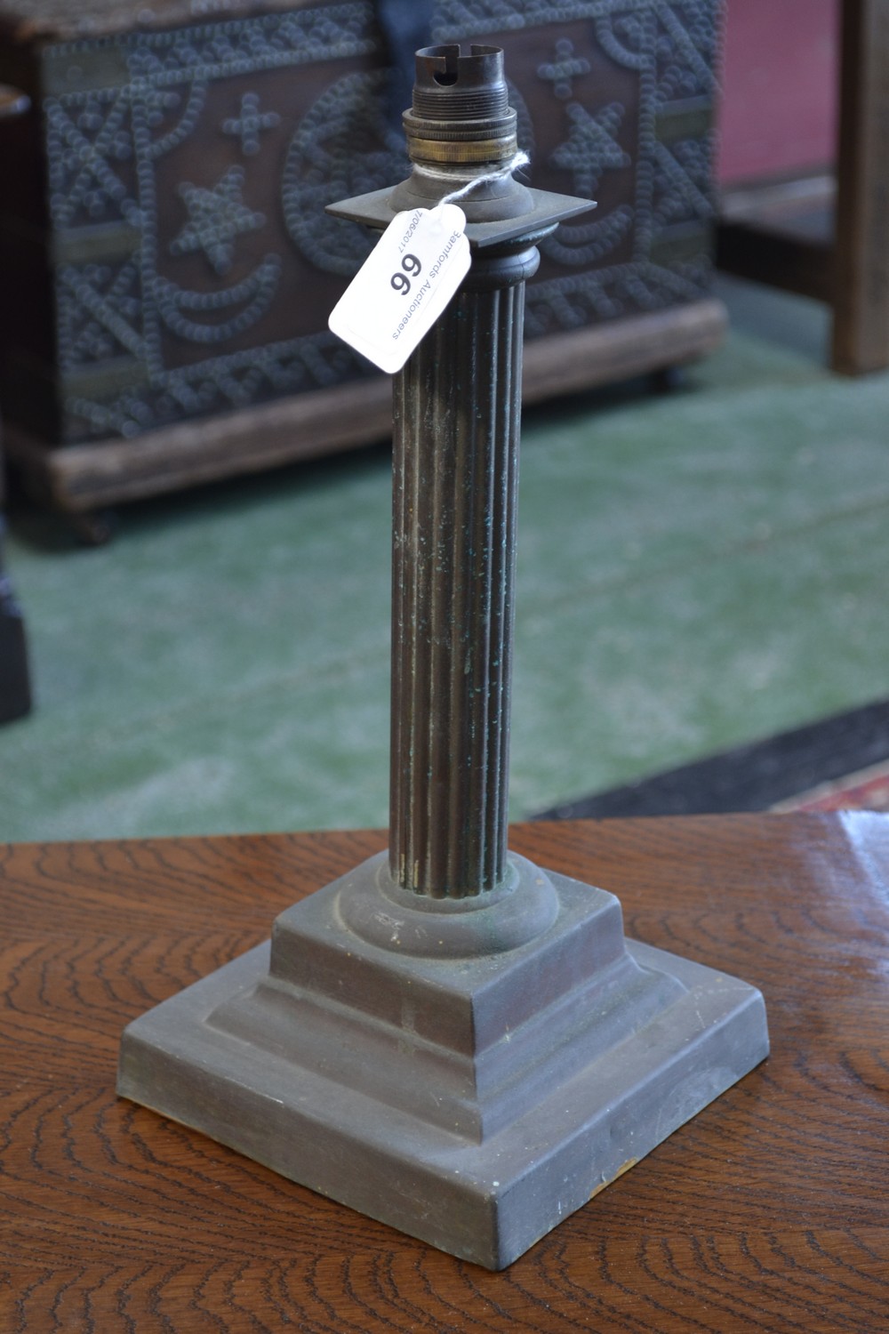 A brass Corinthian column lamp base