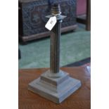 A brass Corinthian column lamp base
