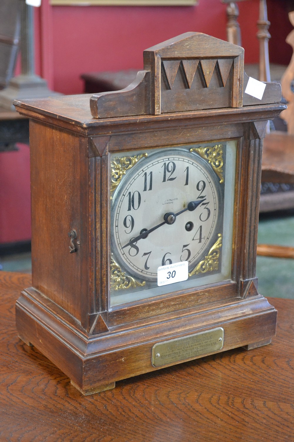 An Edwardian oak cased mantel clock, Walker,