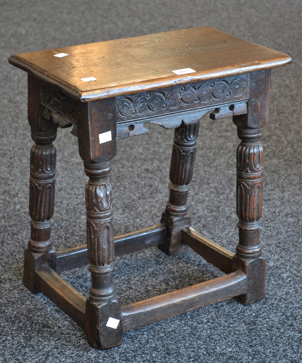 An 18th century oak joint stool,