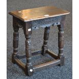 An 18th century oak joint stool,