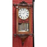 A 19th century American inlaid wall clock