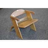 A child's oak Art Deco armchair