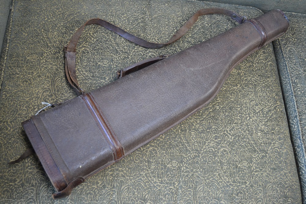 A pigskin shotgun case