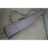 A pigskin shotgun case