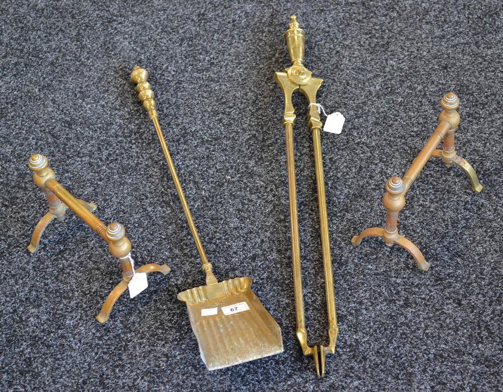 A pair of Victorian brass fire dogs; brass fire irons,