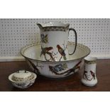 A wash set by, Adderley's Limited, decorated with colourful parrots, comprising wash basin, jug,