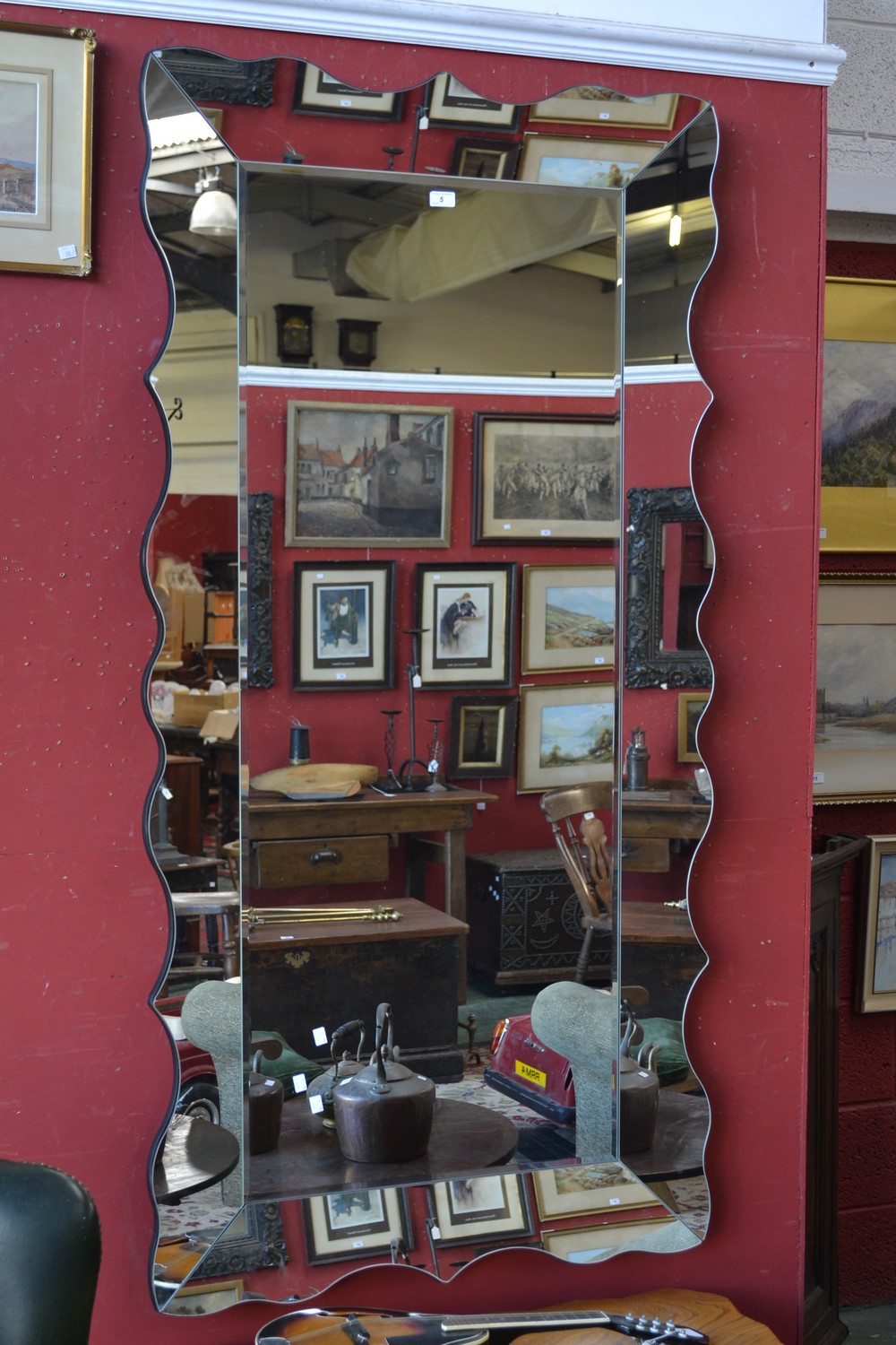 A large modern Venetian style mirror. 180cm x 90cm.