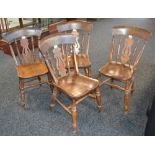 Four elm kitchen chairs pierced splat, spindle back, saddle seat, turned legs, H-frame stretchers.