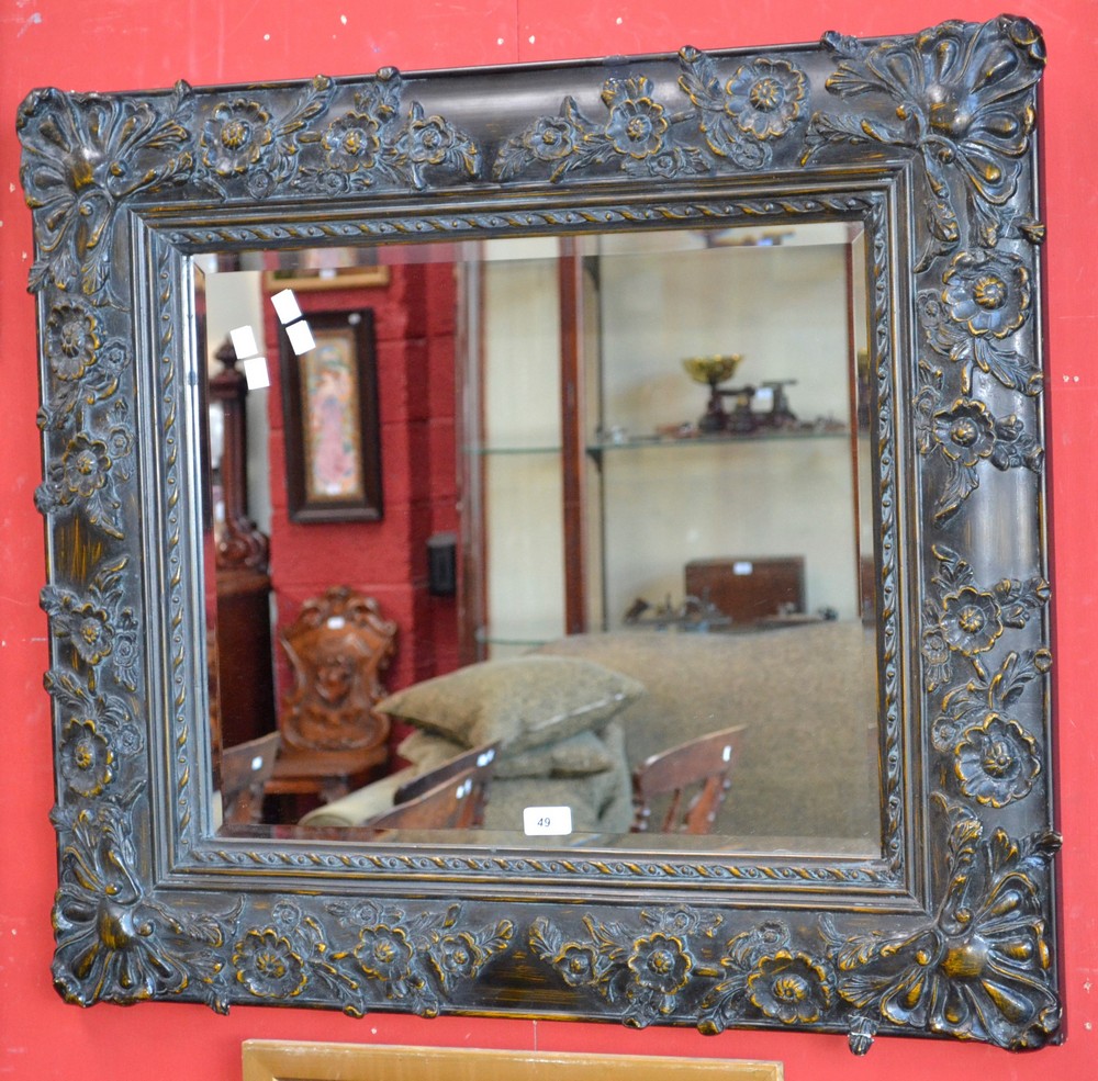 A decorative bevel edged mirror.