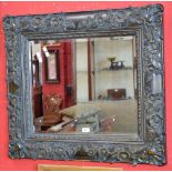 A decorative bevel edged mirror.