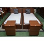 A pair of modern designer single beds,