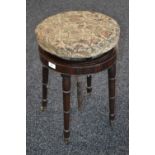 A George IV mahogany adjustable piano stool, c.