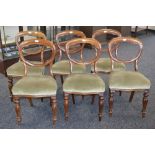 A set of six Victorian mahogany balloon back dining chairs, c.
