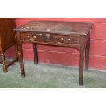 A George III oak lowboy, mahogany crossbanded plank top, long drawer to frieze, brass swing handles,