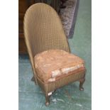 A Lloyd Loom nursing chair