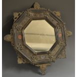 A 19th century Italian bronze and specimen marble mounted octagonal looking glass,