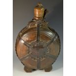 A 19th century Scandinavian leather bound treen water flask or canteen, domed cover,