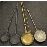 A 19th century Colonial brass pan, shallow circular bowl,