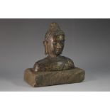 An Asian bronze sculptural fragment, head and bust of Buddha, 10cm wide,