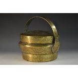 A 19th century Chinese bronze circular hand warmer, swing handle, pierced cover,
