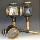 A 19th century brass and black painted coaching lamp, 45cm high; others,