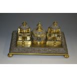 A 19th century gilt brass and electrotype rectangular standish,