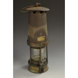 Mining - a miner's lamp, pierced domed canopy, glazed chamber, brass plaque numbered 393,