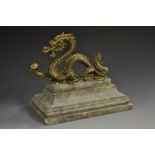 Chinese School (19th century), a gilt bronze, of a dragon chasing a flaming pearl,