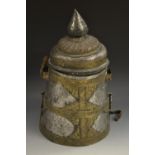 A Middle Eastern brass and tin vessel, pointed bud finial, domed cover, embossed mounts,